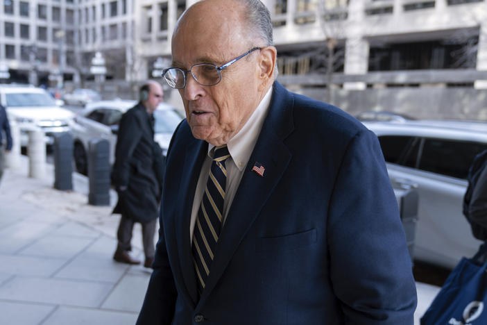 Rudy Giuliani arrives at the federal courthouse in Washington, D.C., on Wednesday for a trial to determine how much he will have to pay two 2020 Georgia election workers who he falsely accused of fraud.