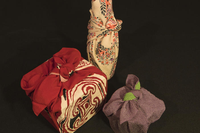 Furoshiki are a type of traditional Japanese wrapping cloth which used to transport clothes, gifts, or other goods. Some are turning to them as a method of holiday wrapping.