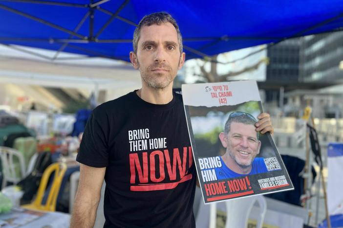 Udi Goren is among the families and supporters of Israelis held in Gaza who are protesting outside Israel's military headquarters, demanding that Israel change its war strategy.