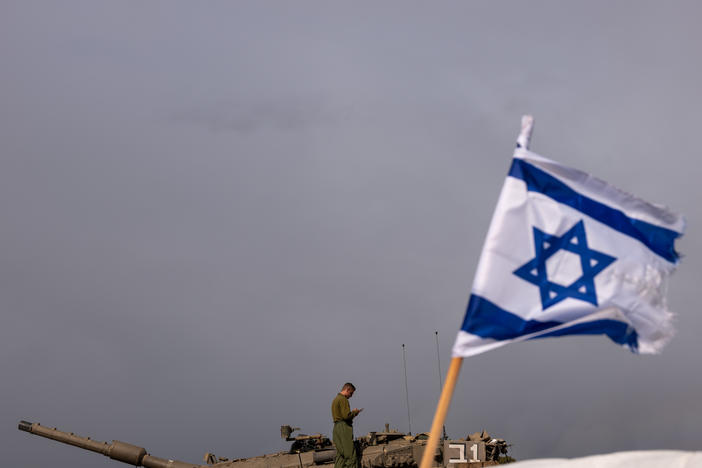 Members of the Israeli military work at a staging area near the border of Gaza during a cease-fire between Israel and Hamas in November.