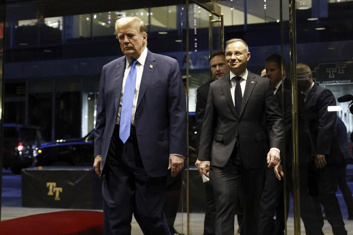 Republican presidential candidate former President Donald Trump walks with Poland's President Andrzej Duda at Trump Tower in midtown Manhattan in New York on Wednesday, April 17, 2024.