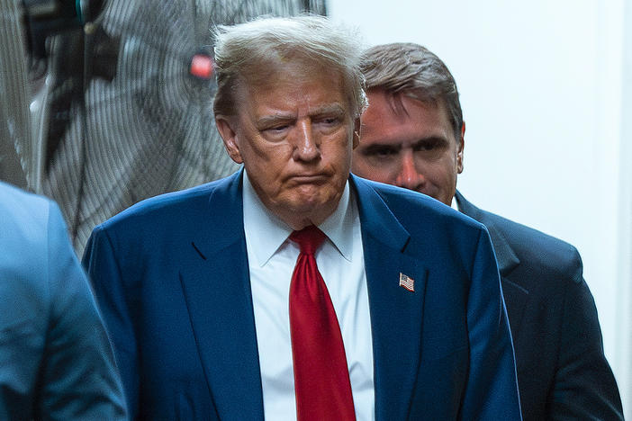 Former U.S. President Donald Trump returns to court during his trial for allegedly covering up hush money payments at Manhattan Criminal Court on April 30, 2024 in New York City.