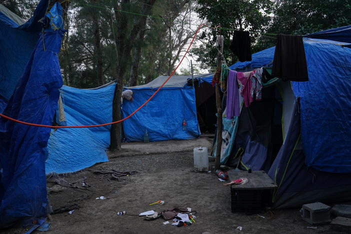Abandoned tents remain at the migrant camp in Matamoros, Mexico, that is at the center of a controversy involving viral images of a flyer encouraging migrants to vote for President Biden.