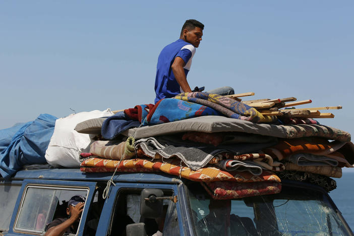 Thousands of Palestinians, including women and children, migrated from the neighborhoods in the east of Rafah and reaches the coastal side of the city of Deir al-Balah.