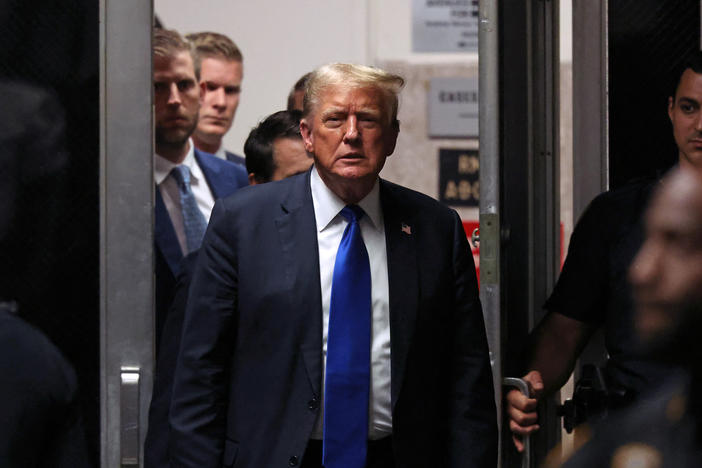 Former US President and Republican presidential candidate Donald Trump returns to the courtroom during his criminal trial at Manhattan Criminal Court in New York City, on May 30, 2024. The jury in Donald Trump's hush money trial announced May 30, 2024 in a note to the court that it has reached a verdict, indicating that this would be delivered in less than an hour.