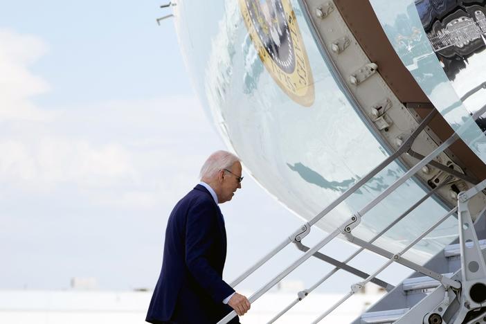President Biden boards Air Force One as he departs Harry Reid International Airport in Las Vegas, Nevada, on July 17, 2024, en route to Delaware, after testing positive for COVID.