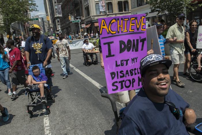 People participate in the first annual Disability Pride Parade on July 12, 2015 in New York City.