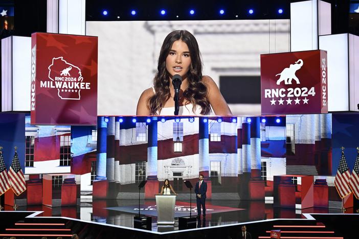 Kai Trump, 17, stands with her dad Donald Trump Jr., son of former U.S. President Donald Trump on stage on the third day of the Republican National Convention at the Fiserv Forum on July 17, 2024 in Milwaukee, Wisconsin.