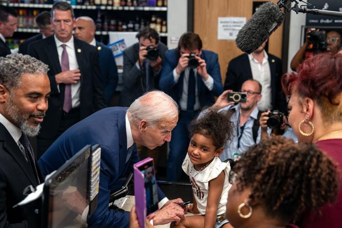 President Biden does some retail campaigning at Mario's Westside Market in Las Vegas, alongside Rep. Steven Horsford, D-Nev., on July 16. A case of COVID took Biden off the trail the following day.