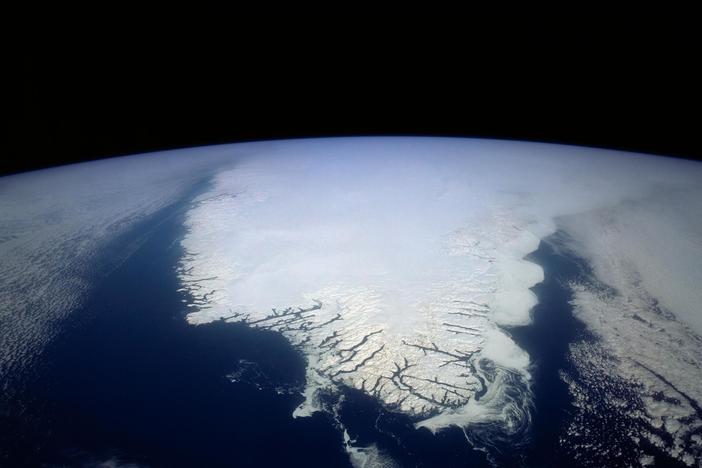 Ice melting from Greenland and the polar regions is causing sea levels to rise, shifting mass around the planet in a way that's starting to slow its spin, scientists are finding.