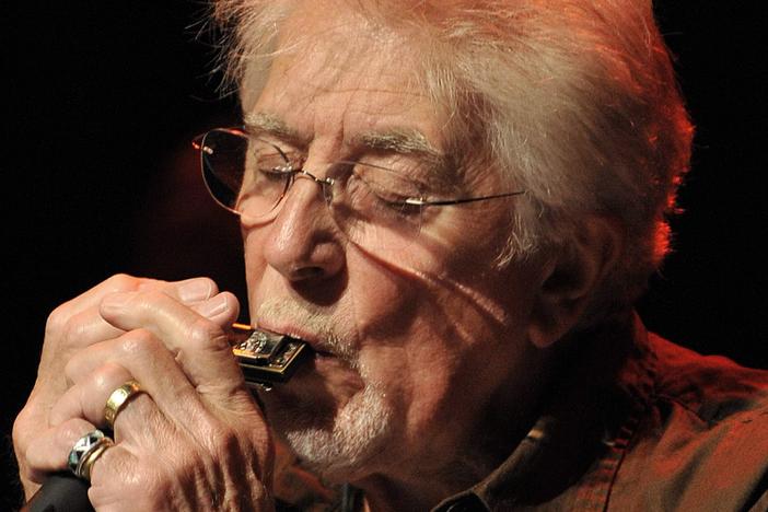 English blues singer John Mayall performs with his band The Bluesbreakers, on the stage of the Miles Davis Hall during the 42nd Montreux Jazz Festival in Montreux, Switzerland, on July 7, 2008.