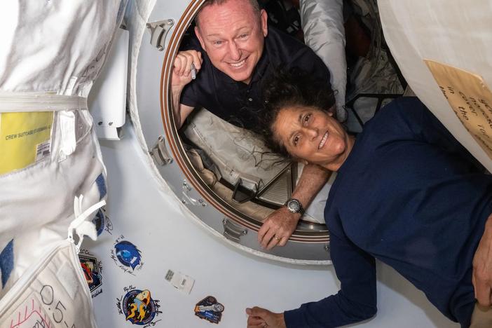 Butch Wilmore and Suni Williams inside the vestibule between the forward port on the International Space Station’s Harmony module and the Starliner spacecraft