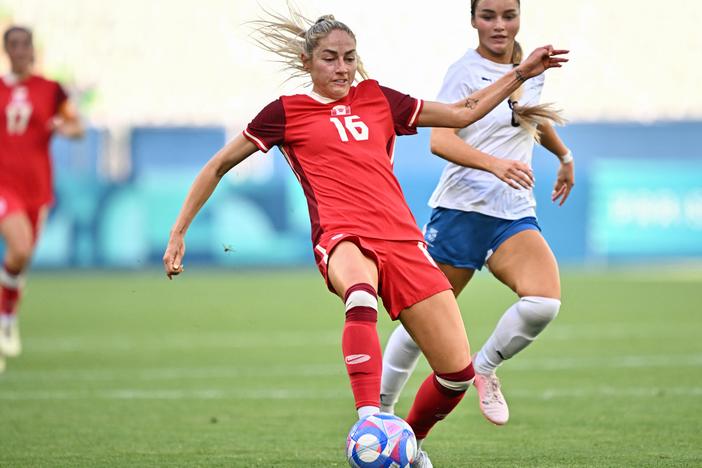 New Zealand midfielder Macey Fraser (right) and Canada forward Janine Beckie fight for the ball during the group match at the Paris 2024 Olympic Games in Saint-Etienne on Thursday.