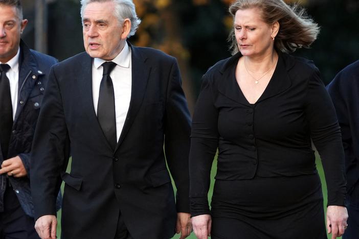 Former British Prime Minister Gordon Brown, shown here with his wife Sarah in 2023, says Rupert Murdoch's U.K. tabloids hacked into his voicemails and documents to learn private information about him and his family. A 2011 police memo shows Washington Post CEO Will Lewis, then working for Murdoch, cited a security threat involving Brown as a reason to delete company emails. 