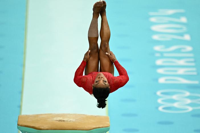 Simone Biles performs her signature 'Yurchenko double pike' to win gold in the gymnastics women's vault final during the Paris 2024 Olympic Games on Saturday at Bercy Arena.