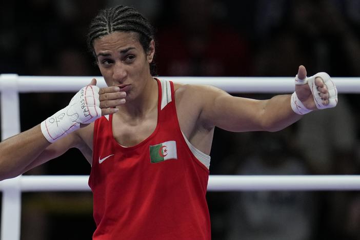 Algeria's Imane Khelif celebrates after defeating Hungary's Anna Hamori in their women's 66kg quarterfinal boxing match on Saturday.