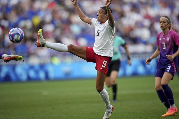 The U.S. women's soccer team defeated Germany 1-0 to advance to its first gold medal match at the Olympics since 2012. The U.S. team's Mallory Swanson fights for the ball during the semifinal match on Tuesday at Lyon Stadium in Decines, France.