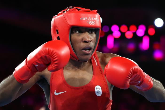 Cindy Ngamba lost in the semifinals but will leave Paris with a bronze medal, a first for the Refugee Olympic Team.