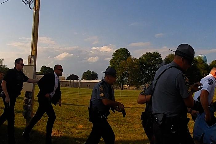 Law enforcement at former President Donald Trump's Butler, Pa., rally on July 13 are captured on body camera footage carrying out one of the wounded victims from the assassination attempt on Trump.