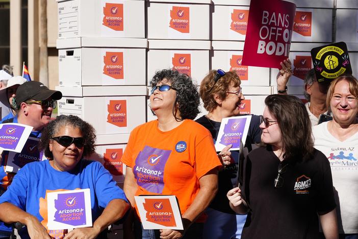 Arizona abortion-rights supporters gather for a news conference prior to delivering more than 800,000 petition signatures to the state Capitol to get abortion rights on the November general election ballot, July 3, 2024, in Phoenix.