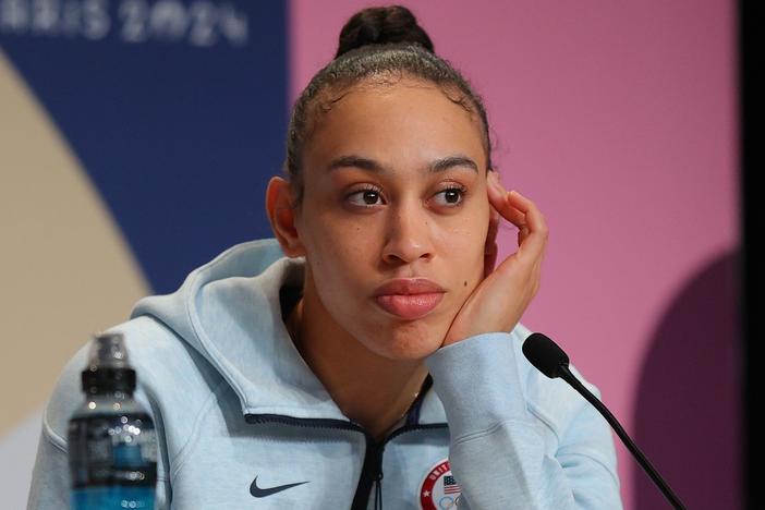 Dearica Hamby speaks during a Team USA 3x3 Basketball press conference in Paris in July. The U.S. women's 3x3 basketball team won bronze at the Olympics last week. 