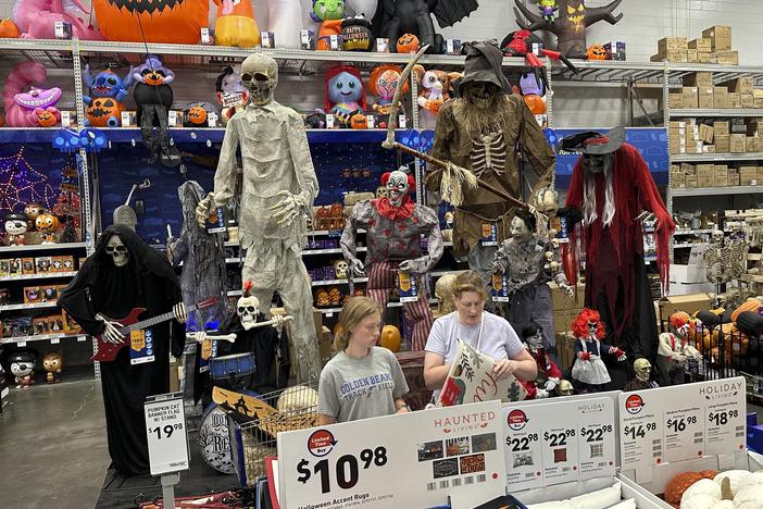 People browse Halloween displays at Lowe's Home Improvement hardware store in East Rutherford, N.J., on Aug. 30, 2023.