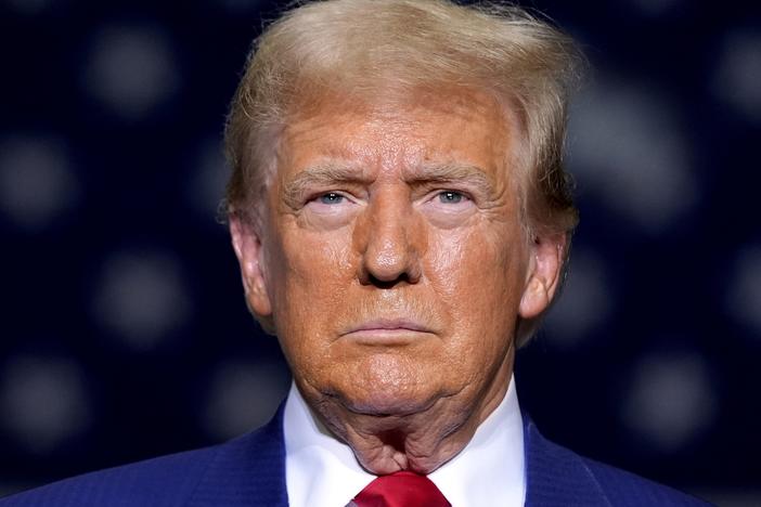 Republican presidential nominee former President Donald Trump arrives to speak at a campaign event in Potterville, Mich., on Thursday.