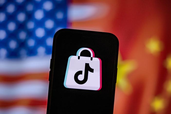 A photo illustration of the TikTok logo next to U.S. and China flags. Researchers have uncovered more accounts tied to a Chinese influence operation known as "Spamoflauge" which includes an account on TikTok with one video that managed to get 1.5 million views before being taken down.