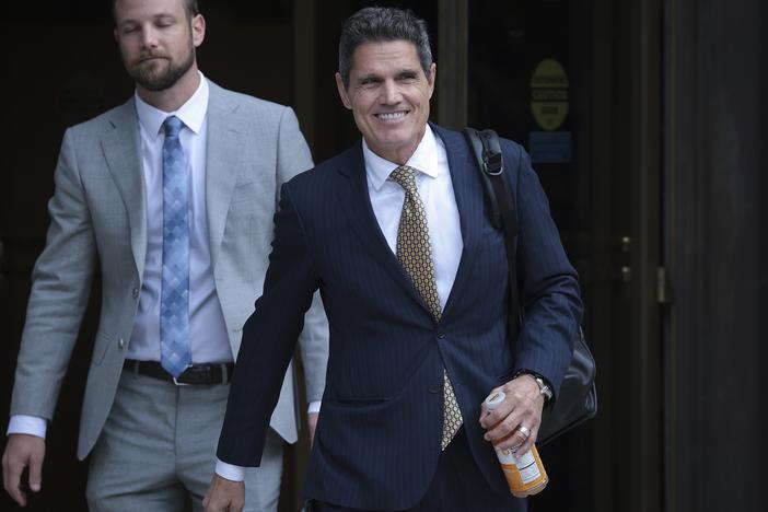 John Lauro (R), an attorney for former President Donald Trump, departs the E. Barrett Prettyman U.S. Court House in 2023.