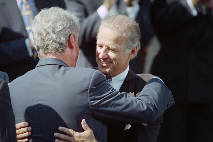 Then-President Bill Clinton (left) hugs then-Sen. Joe Biden on Sept. 13, 1994, during a signing ceremony for the crime bill on the South Lawn of the White House.