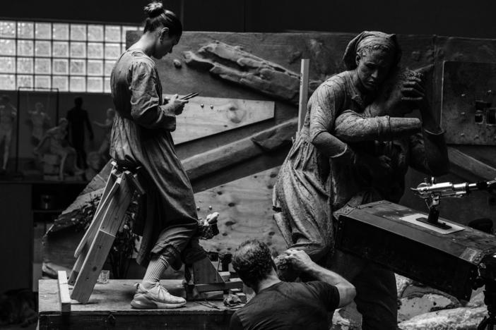 Artist Sabin Howard works on <em>A Soldier's Journey</em>, a 25-ton, 60-foot long bronze sculpture that commemorate Americans who fought in World War I. The national memorial will sit on Washington, D.C.'s Pennsylvania Avenue. 