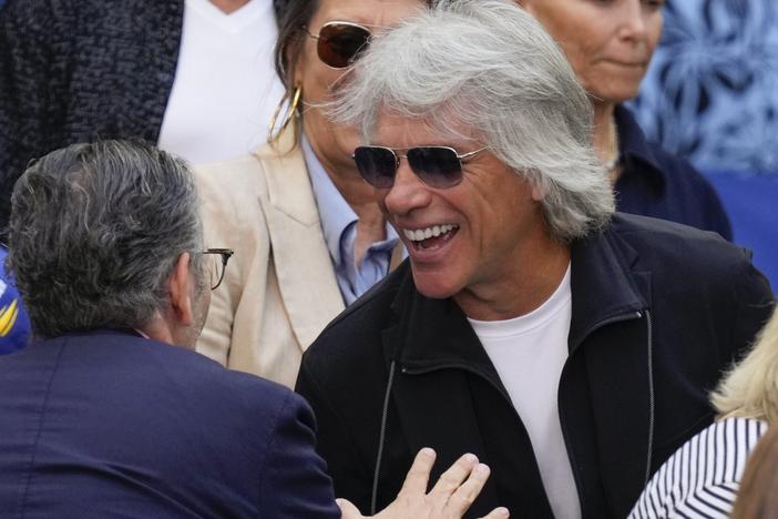 Jon Bon Jovi, pictured at the U.S. Open tennis championships in New York on Sunday, is credited with helping save a woman's life on a Nashville bridge just days later. 