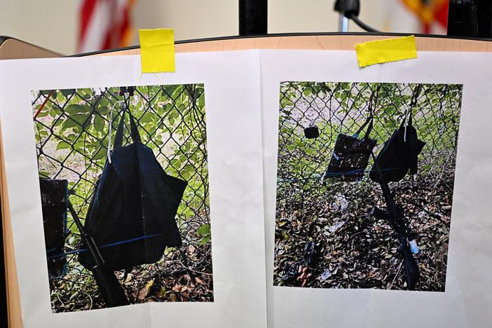 Photos show a rifle and backpack found by law enforcement at the fence of a golf course where former President Donald Trump was on Sunday. Secret Service agents fired at a suspect along the fence in West Palm Beach, Fla. 