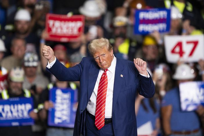 Former President Donald Trump dances to a song as he leaves a rally in Johnstown, Pa., on Aug. 30.