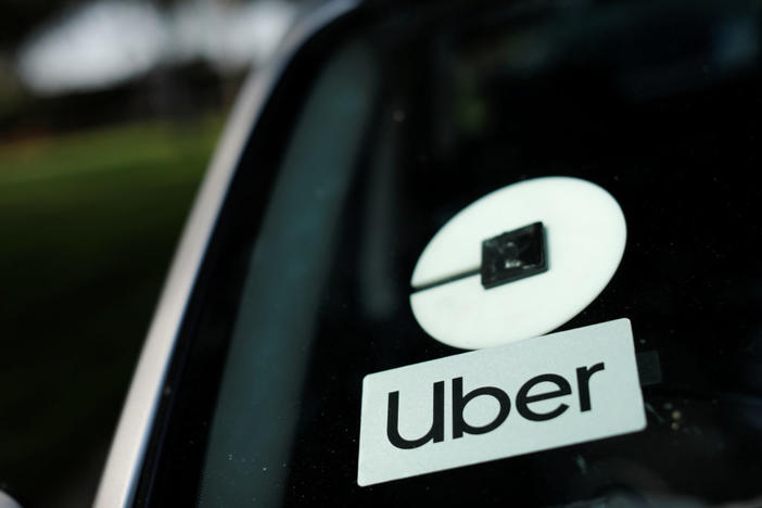An Uber logo is shown on a rideshare vehicle during a statewide day of action to demand that ride-hailing companies Uber and Lyft follow California law and grant drivers "basic employee rights'', in Los Angeles, California, U.S., August 20, 2020. Photo by Mike Blake/REUTERS