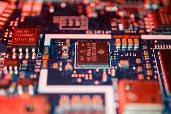Semiconductor chips are seen on a circuit board of a computer in this illustration picture taken February 25, 2022. Photo by Florence Lo/Illustration/REUTERS