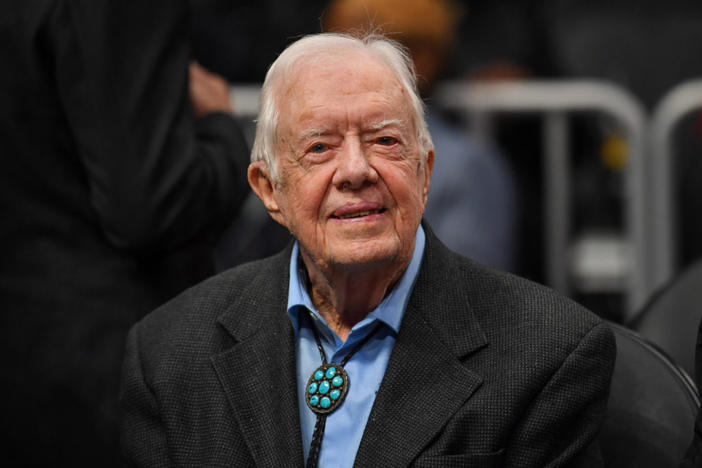 Former President Jimmy Carter attends a game between the Atlanta Hawks and the New York Knicks at State Farm Arena, in Atlanta, Georgia, Feb 14, 2019. File photo by Dale Zanine/USA TODAY Sports via REUTERS