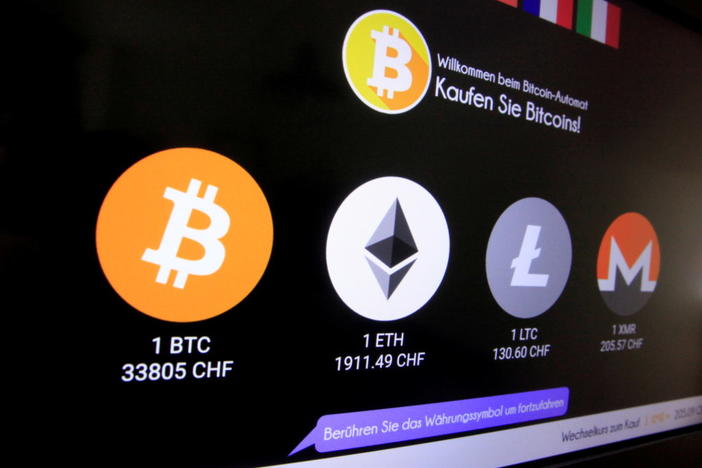 The exchange rates and logos of Bitcoin (BTH), Ether (ETH), Litecoin (LTC) and Monero (XMR) are seen on the display of a cryptocurrency ATM of blockchain payment service provider Bity at the House of Satoshi bitcoin and blockchain shop in Zurich, Switzerland June 25, 2021. Photo by Arnd Wiegmann/REUTERS