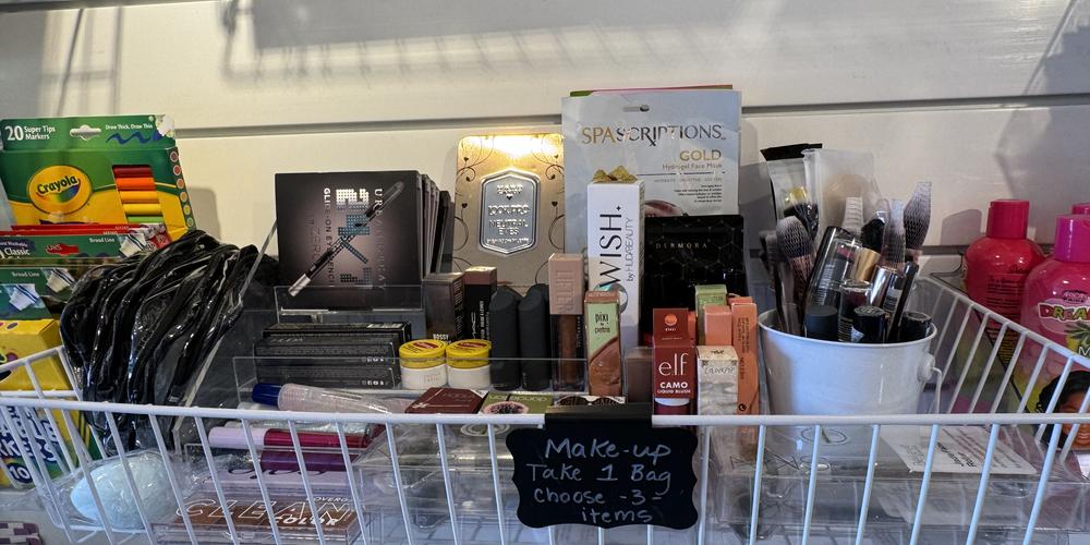 Makeup products inside The Bloom Closet Express truck.