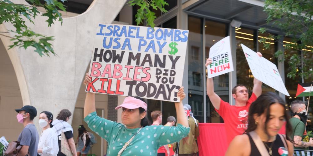 Protestors in support of Palestine rally in Midtown Atlanta on June 27, 2024.