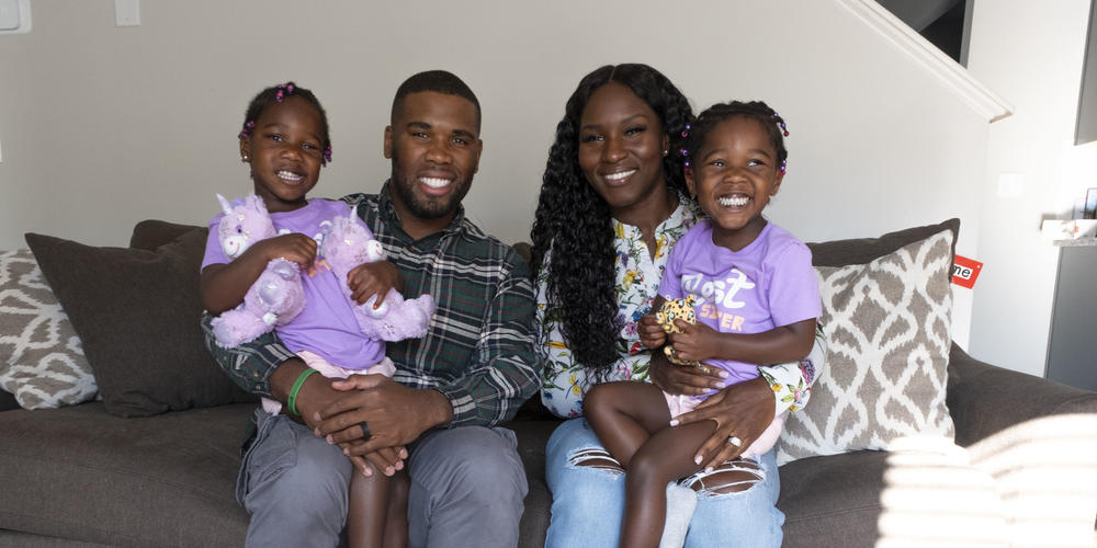 The Altidor family poses for a portrait. 