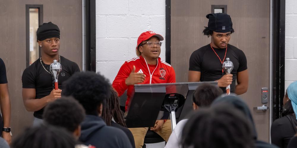 Band Director Lynel Goodwin leads the Jonesboro High Majestic Marching Cardinals in their final rehearsal before performing in the Macy's Thanksgiving Day Parade.