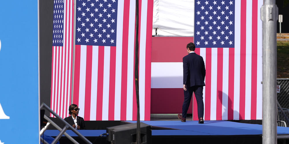 Sen. Jon Ossoff exits the stage after he speaks at a rally for Vice President Kamala Harris on Nov. 2, 2024.