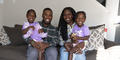 The Altidor family poses for a portrait. 