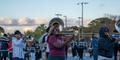 The Jonesboro High Majestic Marching Cardinals play their instruments during their final band practice before heading off to the Macy's Thanksgiving Day Parade.